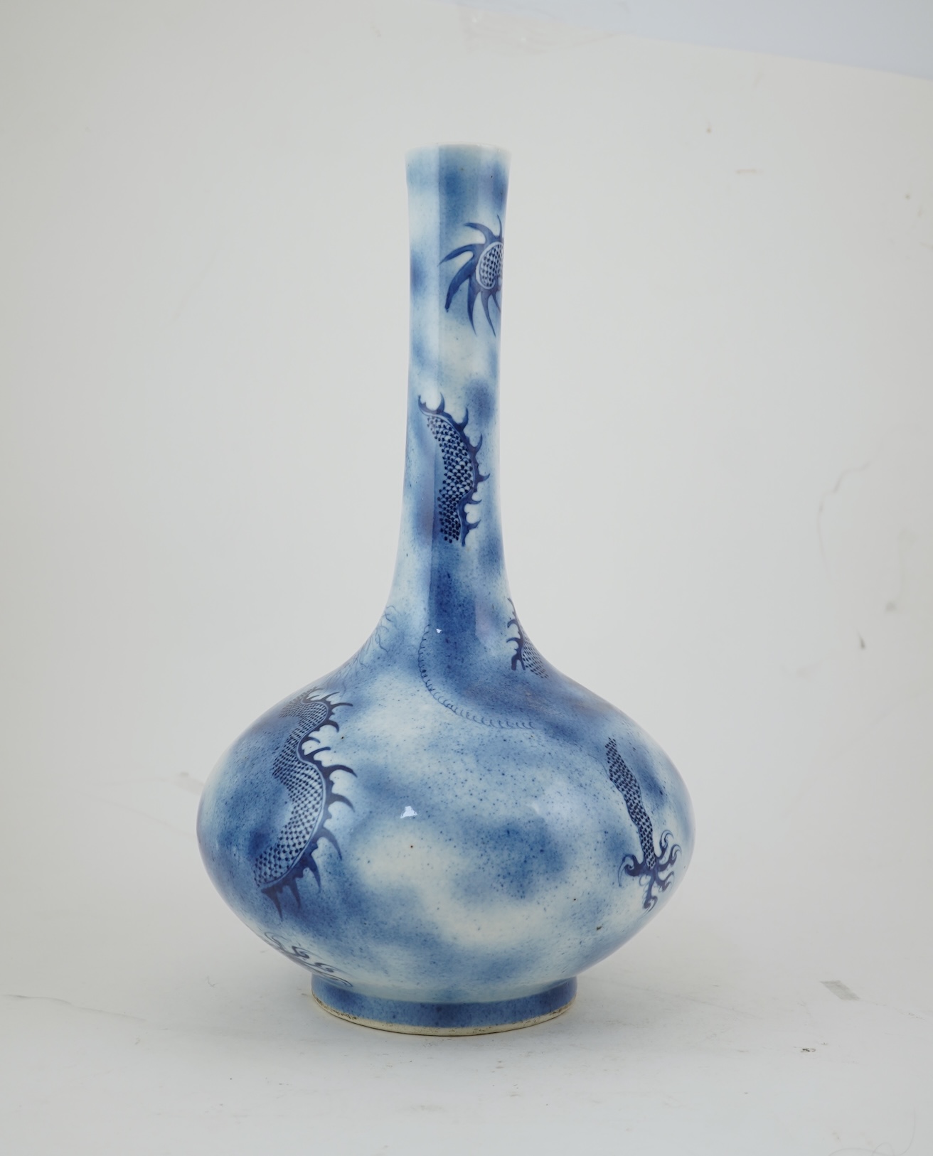 A Chinese blue and white ‘dragon’ bottle vase, 19th century
